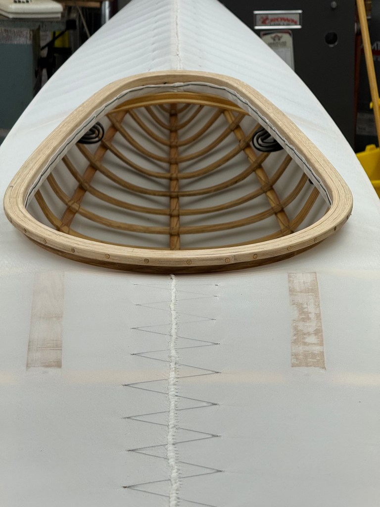 Image of uncoated skin on frame kayak.