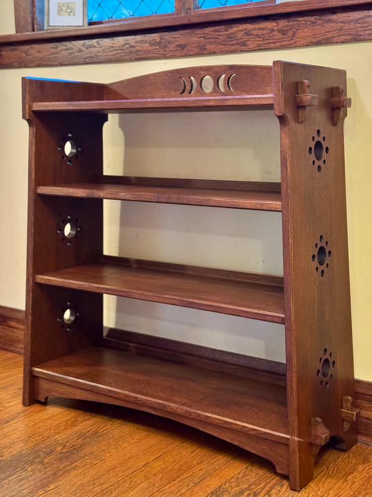 Image of white oak moon phase mortise and tenon bookcase.